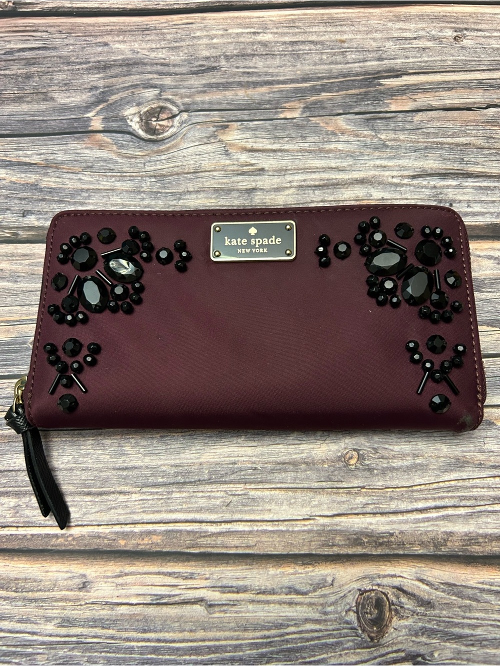 Kate Spade Maroon Zip-Around Wallet with Black Jeweled Accents